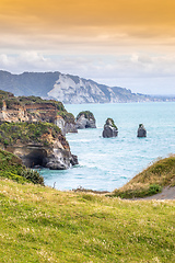 Image showing sea shore rocks and mount Taranaki, New Zealand