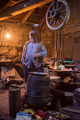 Image showing portrait of confident senior blacksmith