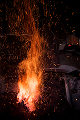 Image showing Traditional blacksmith furnace with burning fire