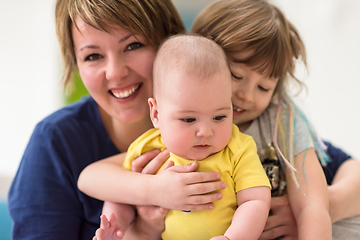 Image showing portrait of young mother with  her kids