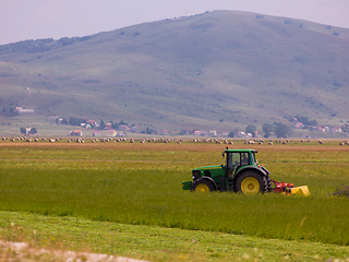 Image showing Man driving tractor