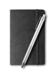 Image showing black closed notebook and pen isolated on white