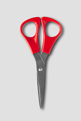 Image showing Pair of scissors isolated on grey background