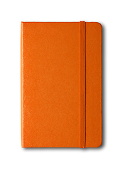 Image showing Orange closed notebook isolated on white