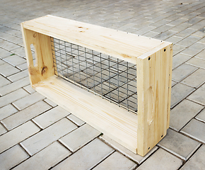 Image showing Sieve with a wooden frame for garden works