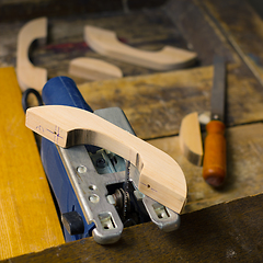 Image showing Wooden handles for furniture from alder and fretsaw