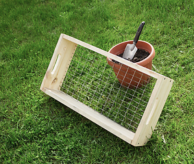 Image showing Sieve for garden works and scoop