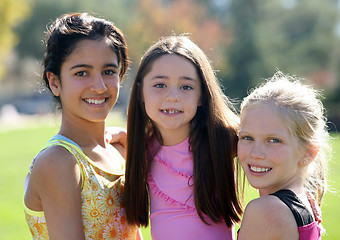 Image showing Three smiling girls