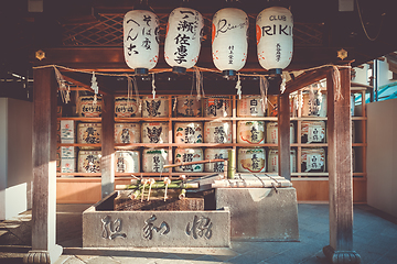 Image showing Kazaridaru barrels in Maruyama garden, Kyoto, Japan