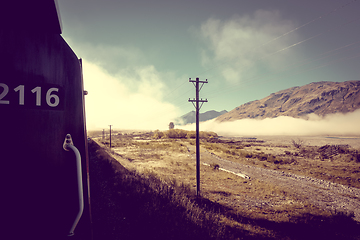 Image showing Train in Mountain fields landscape, New Zealand