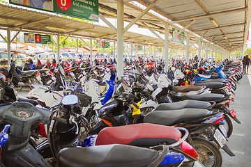 Image showing Many residents of Bangkok use two-wheeled transport