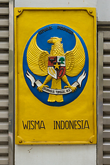 Image showing Label with coat of arms of Indonesia on gates of embassy