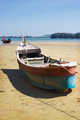 Image showing Boat on land in the area of sea tide