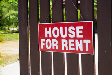 Image showing Announcement for rent houses on the fence