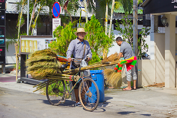 Image showing Thais selling brooms on the streets
