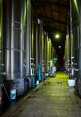 Image showing metal wine barrels in a winery