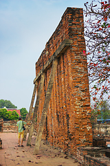 Image showing Tourist on ruins of an monastery, Thailand 