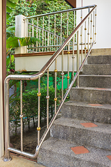 Image showing Steel railing on a stone staircase