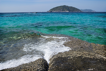 Image showing Easy surf washes coastal stones