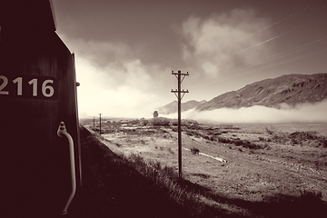 Image showing Train in Mountain fields landscape, New Zealand