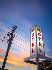 Image showing Vintage motel sign at sunset 