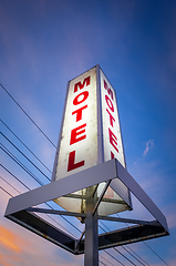 Image showing Vintage motel sign at sunset 