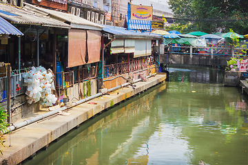 Image showing Houses standing above the water channel. Bangkok