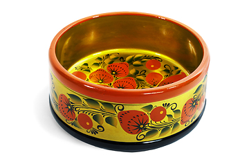 Image showing Wooden not deep bowl, painted with floral ornament in style of Khokhloma