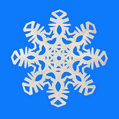 Image showing Snowflake cut out of paper on a blue background