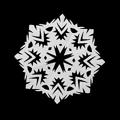 Image showing White snowflake cut out of paper on black background