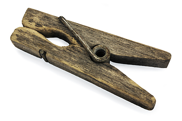 Image showing Decrepit wooden clothespin on white background 