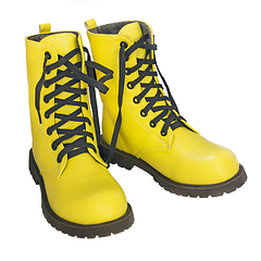 Image showing Yellow shoes with black lacing on white background