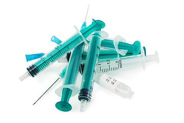 Image showing Used syringes and ampoules on a white background 