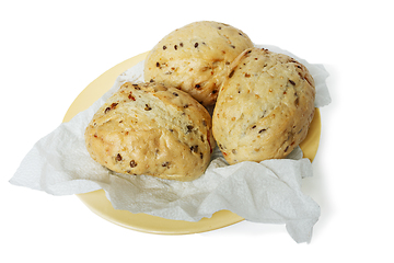 Image showing Three Bun wheat on a paper napkin on white