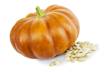 Image showing Pumpkin with bright peel and seeds on white