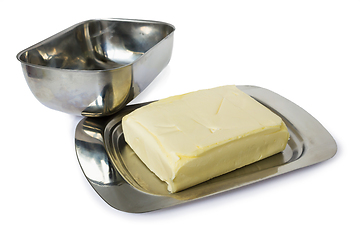 Image showing Pack of yellowish butter in flatware  for butter