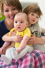 Image showing portrait of young mother with  her kids