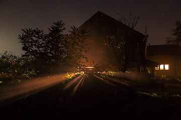 Image showing the house with the burning window at night