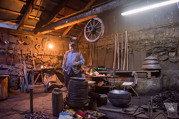 Image showing portrait of confident senior blacksmith