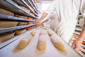 Image showing bakers preparing the dough