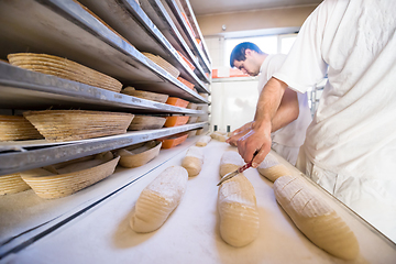 Image showing bakers preparing the dough