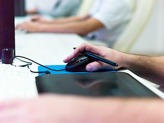 Image showing Closeup of Graphic Designer Working at Workplace