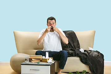 Image showing Young man suffering from hausehold dust or seasonal allergy