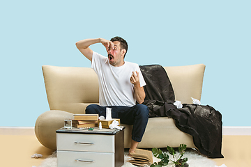 Image showing Young man suffering from hausehold dust or seasonal allergy