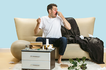 Image showing Young man suffering from hausehold dust or seasonal allergy