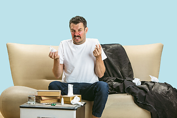 Image showing Young man suffering from hausehold dust or seasonal allergy