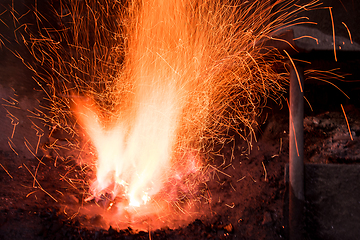 Image showing Traditional blacksmith furnace with burning fire