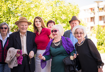 Image showing group portrait of senior people with geriatric nurse