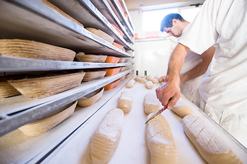 Image showing bakers preparing the dough