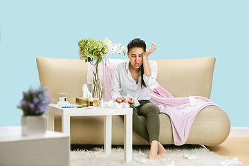 Image showing Young woman suffering from hausehold dust or seasonal allergy.